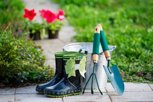 Kew gardeners explaining local garden maintenance expertise