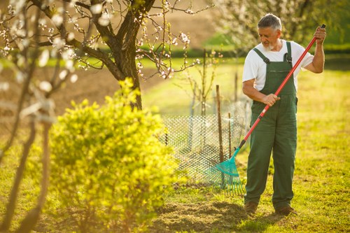 Professional gardeners in Kew using protective equipment